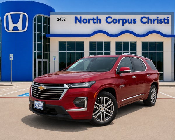 2022 Chevrolet Traverse High Country in Cherry Red Tintcoat — front three-quarter view