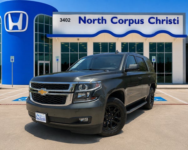 2019 Chevrolet Tahoe LT in Deepwood Green Metallic — front three-quarter view