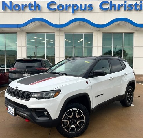 2025 Jeep Compass Trailhawk in Bright White Clearcoat — front three-quarter view