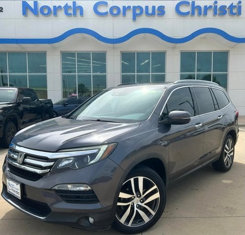 2018 Honda Pilot Touring in Modern Steel — front three-quarter view